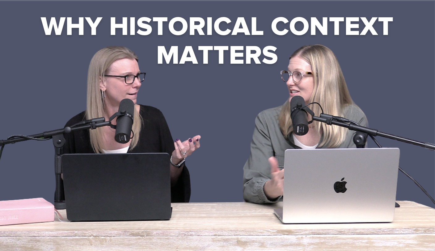 Two women wearing glasses sit at a table with laptops and microphones, with the text “Why historical context matters” displayed above them.